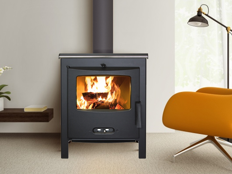 <b>Reference:</b> SAGRA CP <br> 
<b>Description:</b><br>- Steel stove with cast
iron door.<br>
- Double combustion system <br>
- Extra clean glass system<br>
- Heat output range: 6.5-11.5kW <br>
- Nominal heat output: 9kW <br>
- Flue socket: ø120 MM<br>
- Heating area: 80 m2 <br>
- Heating volume: 200 m3 <br>
<b>Dimensions:</b><br>- L= 54CM<br>- W= 37CM<br>- H= 70CM<br><b>Weight:</b> 70KG